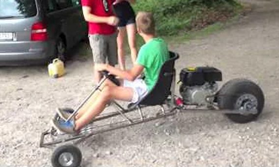 Teenager driving a finished Scorpion three-wheeler